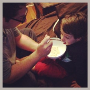A boy, his dad, and some cereal